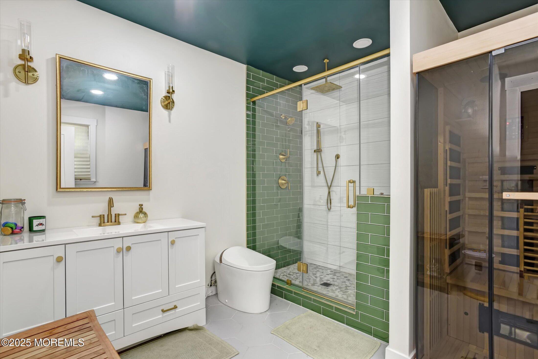 10 Bowman Road Jackson, NJ 08527 - Photo 20 of 32 a bathroom with a double vanity sink toilet and shower