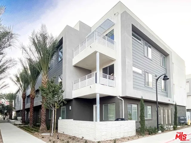 a view of a building with a street