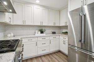 7106 Brooktree Way San Jose, CA 95120 - Photo 14 of 36 a kitchen with white cabinets and white appliances