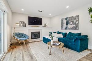 7106 Brooktree Way San Jose, CA 95120 - Photo 17 of 36 a living room with furniture a flat screen tv and a fireplace
