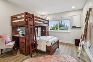 7106 Brooktree Way San Jose, CA 95120 - Photo 23 of 36 a bedroom with a bed and a flat tv screen on dresser