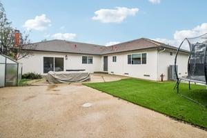7106 Brooktree Way San Jose, CA 95120 - Photo 32 of 36 a backyard of a house with garden and barbeque oven