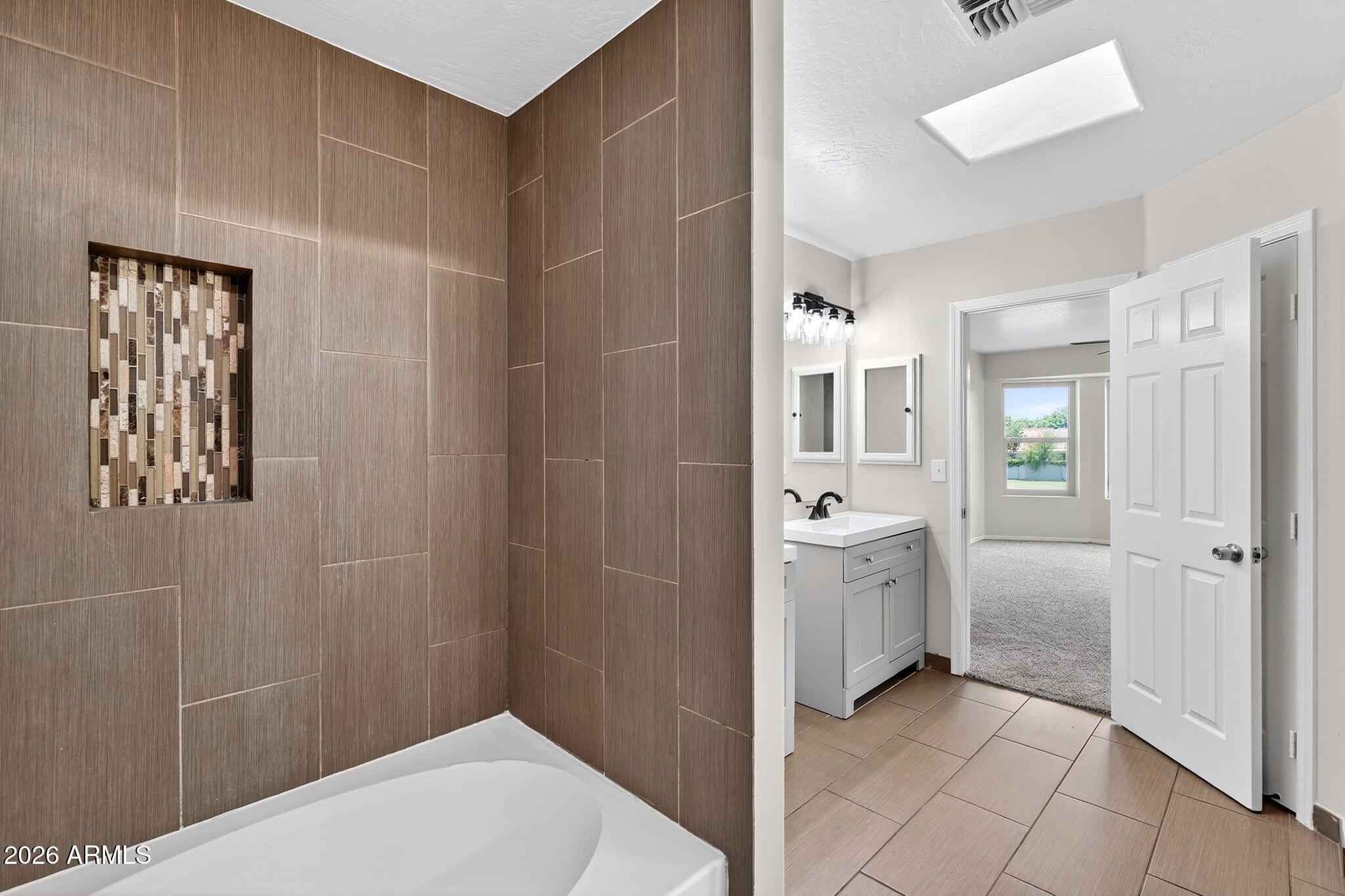 1417 East Mineral Road Gilbert, AZ 85234 - Photo 37 of 59 a bathroom with a bathtub and shower