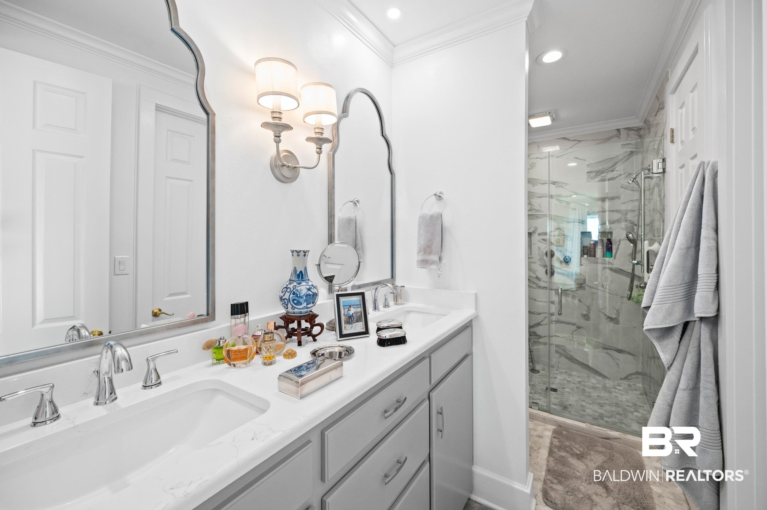 31835 River Road Orange Beach, AL 36561 - Photo 15 of 55 Bathroom featuring ornamental molding, an enclosed shower, and vanity