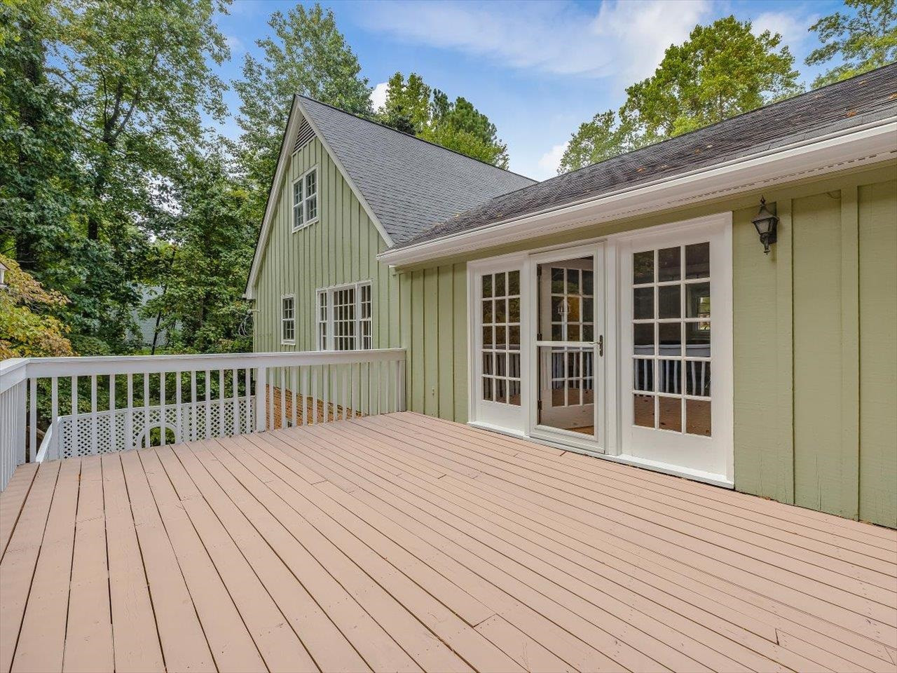 4725 Oak Park Road Raleigh, NC 27612 - Photo 23 of 75 a view of backyard with deck and wooden floor