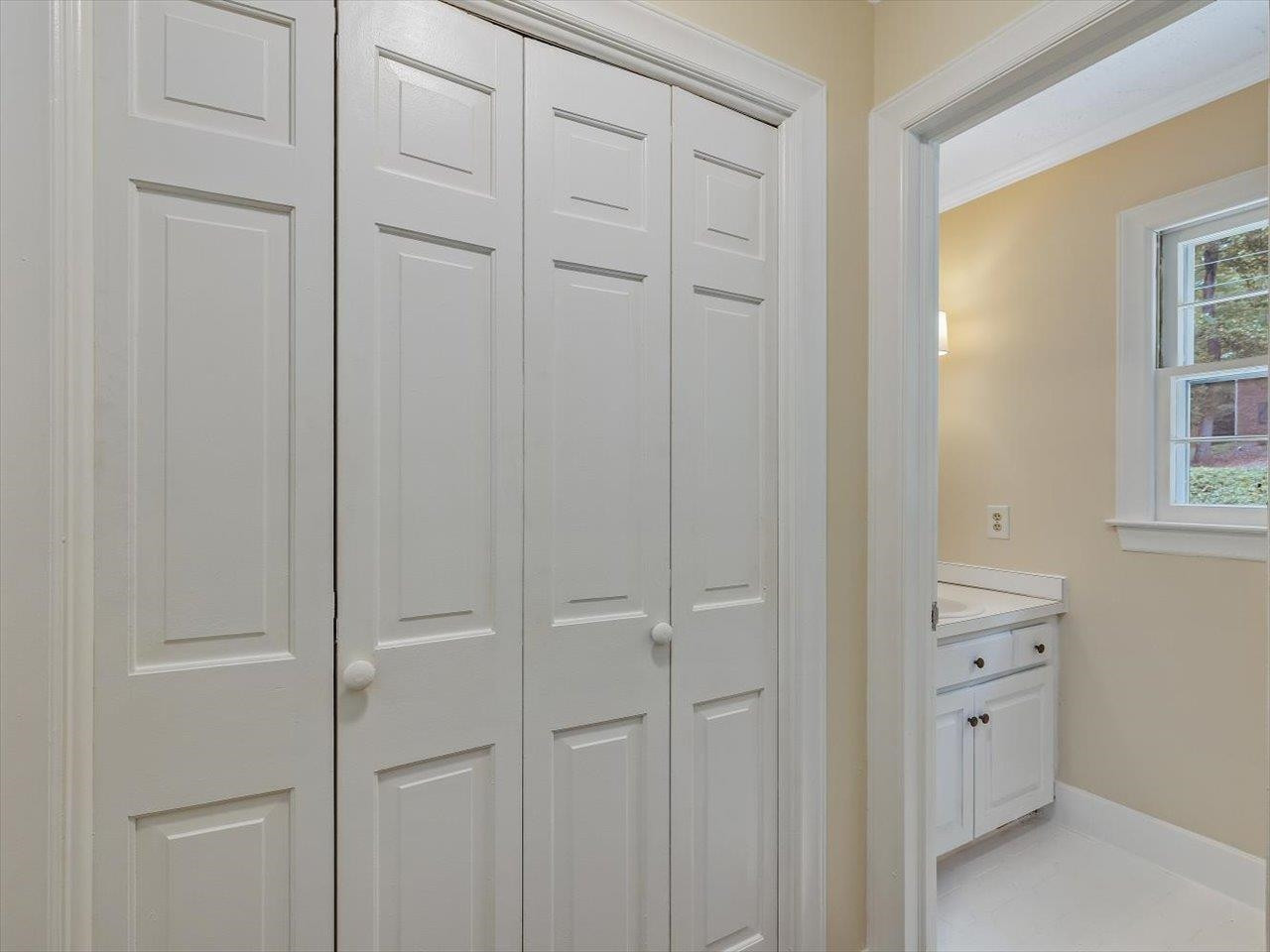 4725 Oak Park Road Raleigh, NC 27612 - Photo 27 of 75 a view of a closet area with closet area