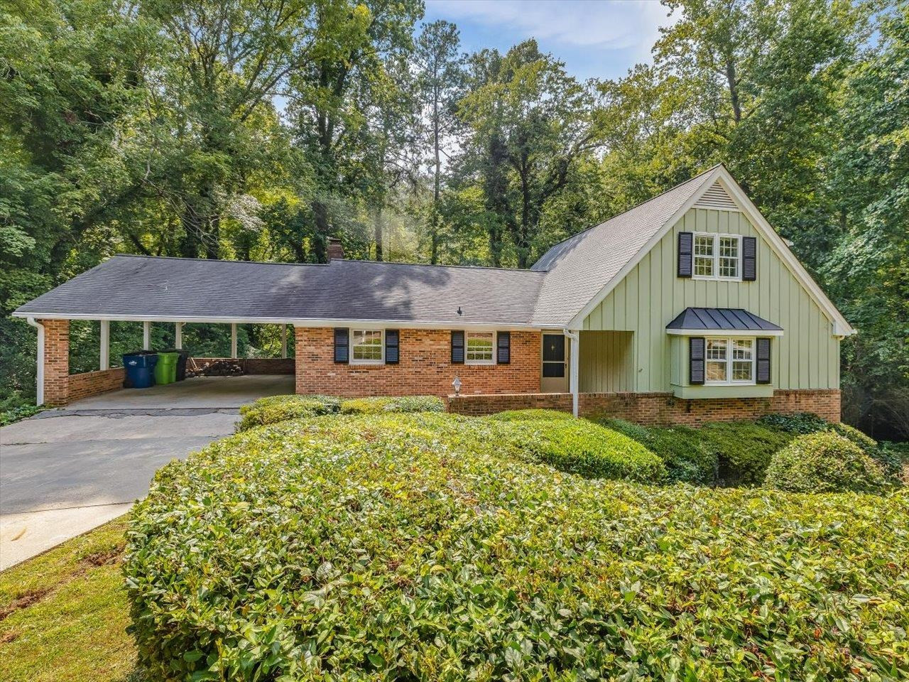 4725 Oak Park Road Raleigh, NC 27612 - Photo 3 of 75 a front view of a house with garden