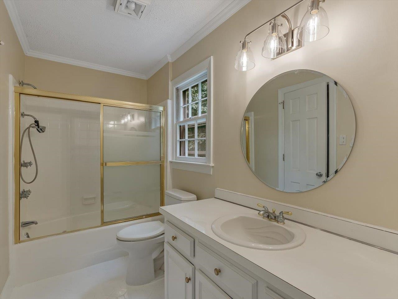 4725 Oak Park Road Raleigh, NC 27612 - Photo 32 of 75 a bathroom with a sink toilet and shower