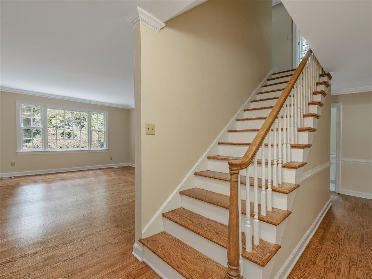 4725 Oak Park Road Raleigh, NC 27612 - Photo 35 of 75 a view of entryway and hall with wooden floor