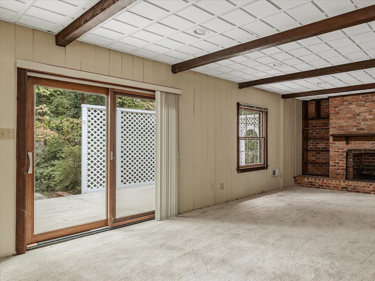 4725 Oak Park Road Raleigh, NC 27612 - Photo 49 of 75 a view of an empty room with a fireplace