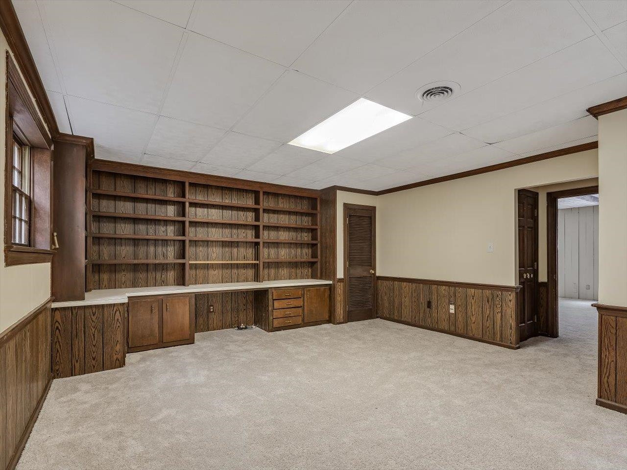 4725 Oak Park Road Raleigh, NC 27612 - Photo 55 of 75 a view of an empty room with furniture and window