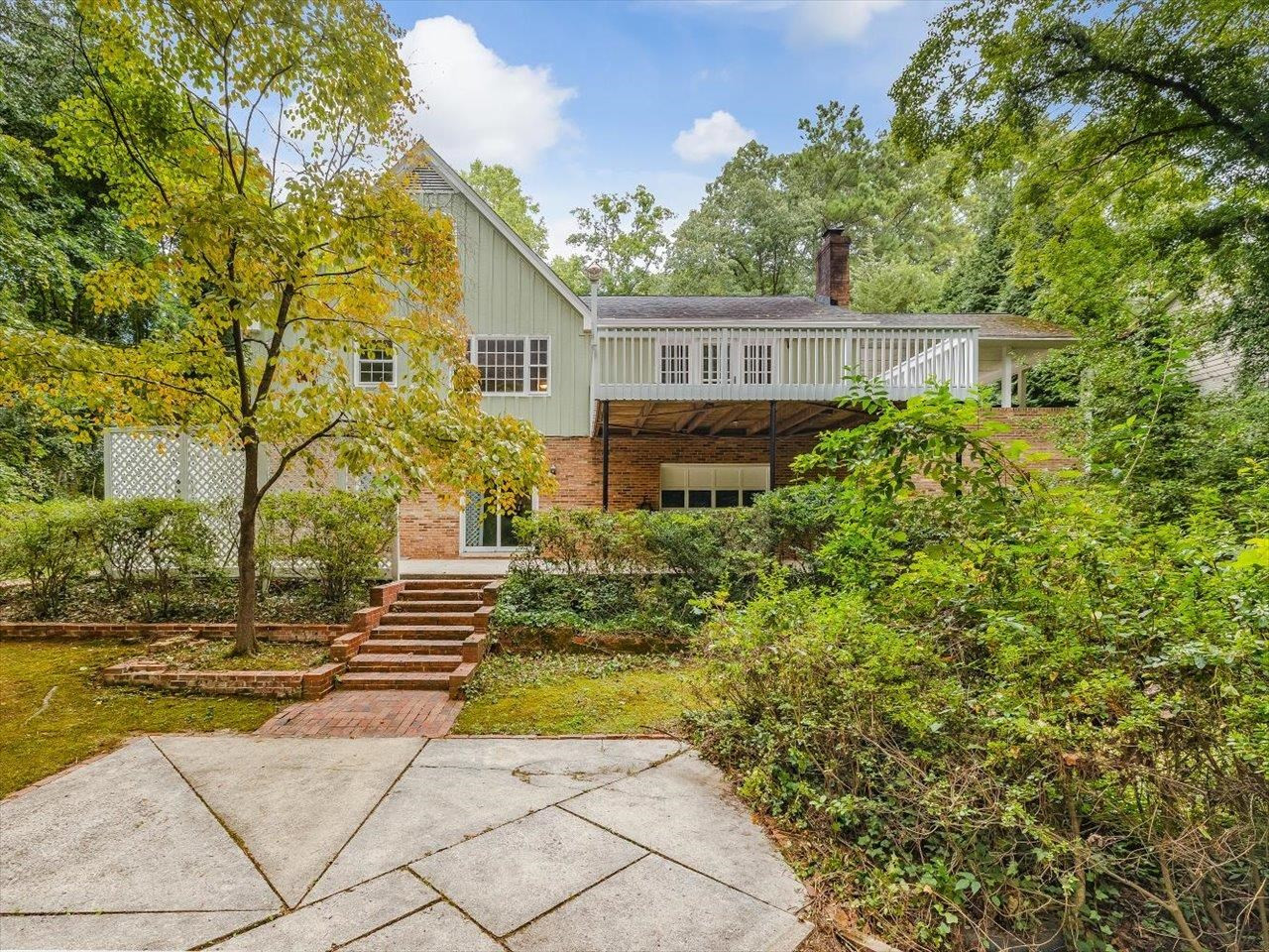 4725 Oak Park Road Raleigh, NC 27612 - Photo 72 of 75 a view of a yard with plants and large trees
