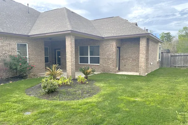 a front view of house with yard