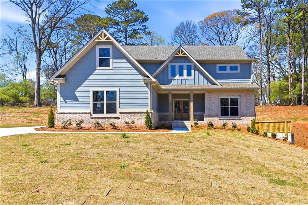 a front view of a house with a outdoor space