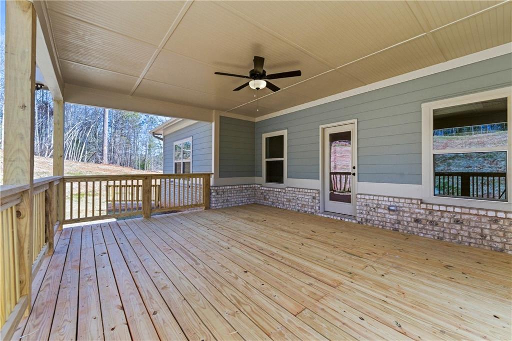 158 Races Road Hoschton, GA 30548 - Photo 21 of 24 a view of a house with wooden floor
