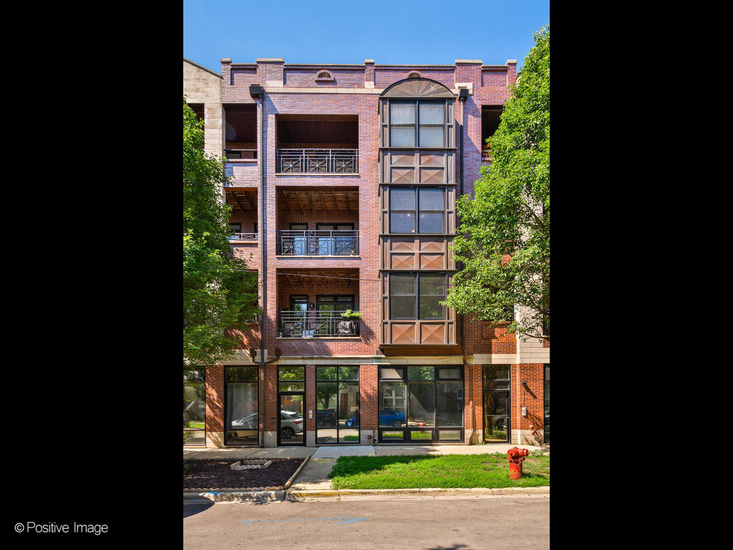 2128 West Rice Street, Unit 3 Chicago, IL 60622 - Photo 1 of 23 a view of a building with a garden and plants