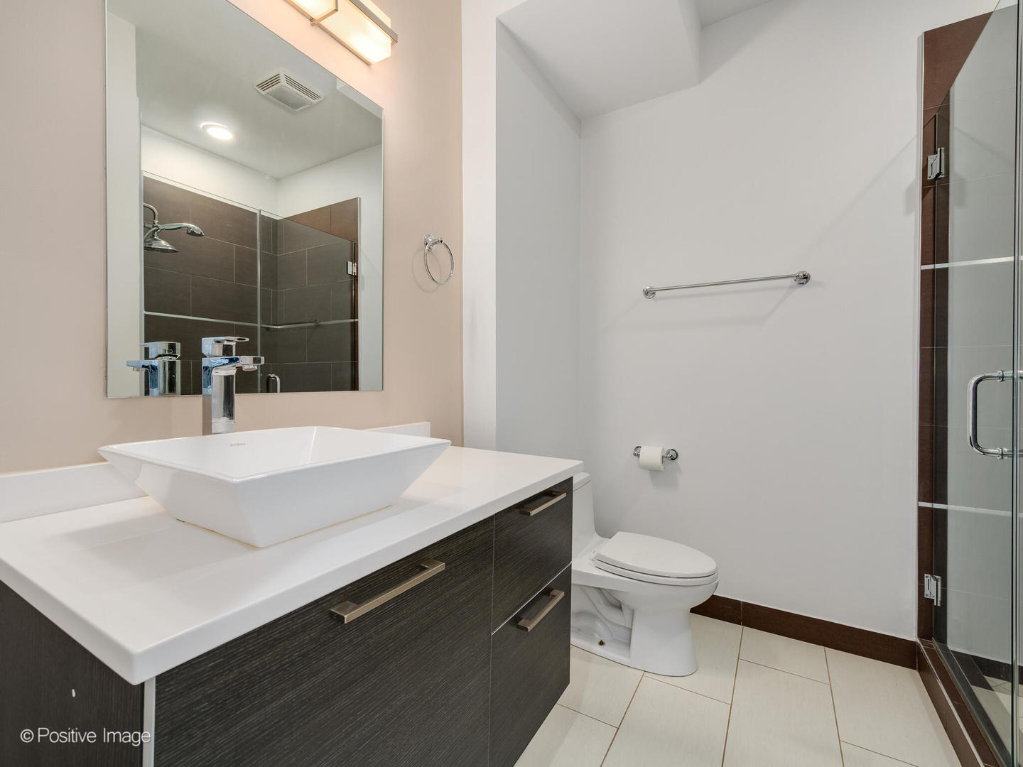 2128 West Rice Street, Unit 3 Chicago, IL 60622 - Photo 22 of 23 a bathroom with a sink toilet and shower