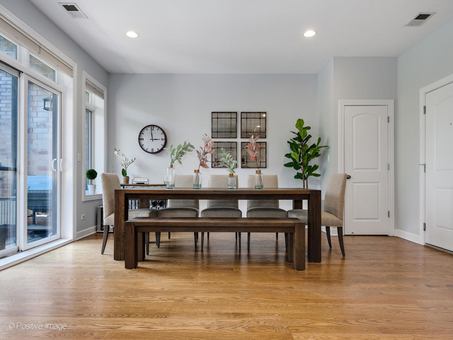 2128 West Rice Street, Unit 3 Chicago, IL 60622 - Photo 8 of 23 a dining room with furniture window and wooden floor