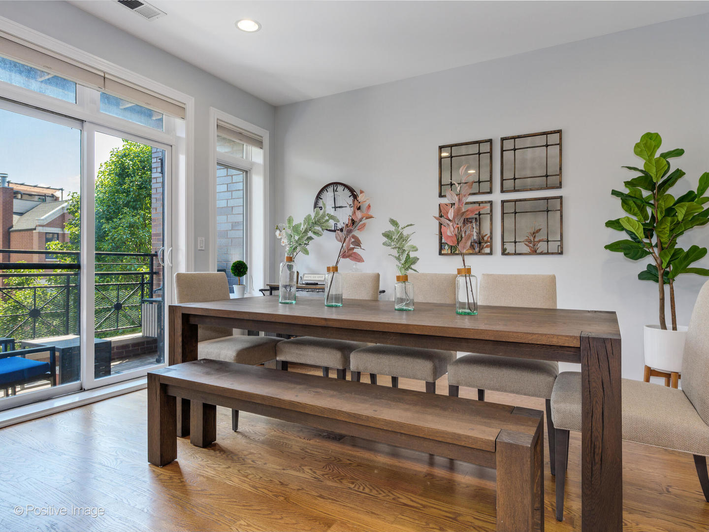 2128 West Rice Street, Unit 3 Chicago, IL 60622 - Photo 9 of 23 a living room with furniture and a potted plant