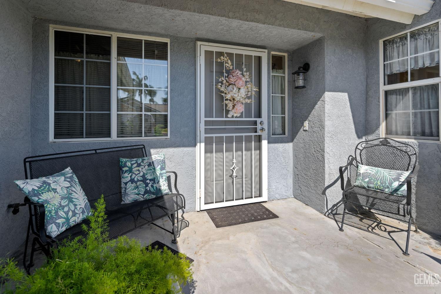 Undisclosed Address Bakersfield, CA 93312 - Photo 5 of 40 a bedroom with furniture and a window
