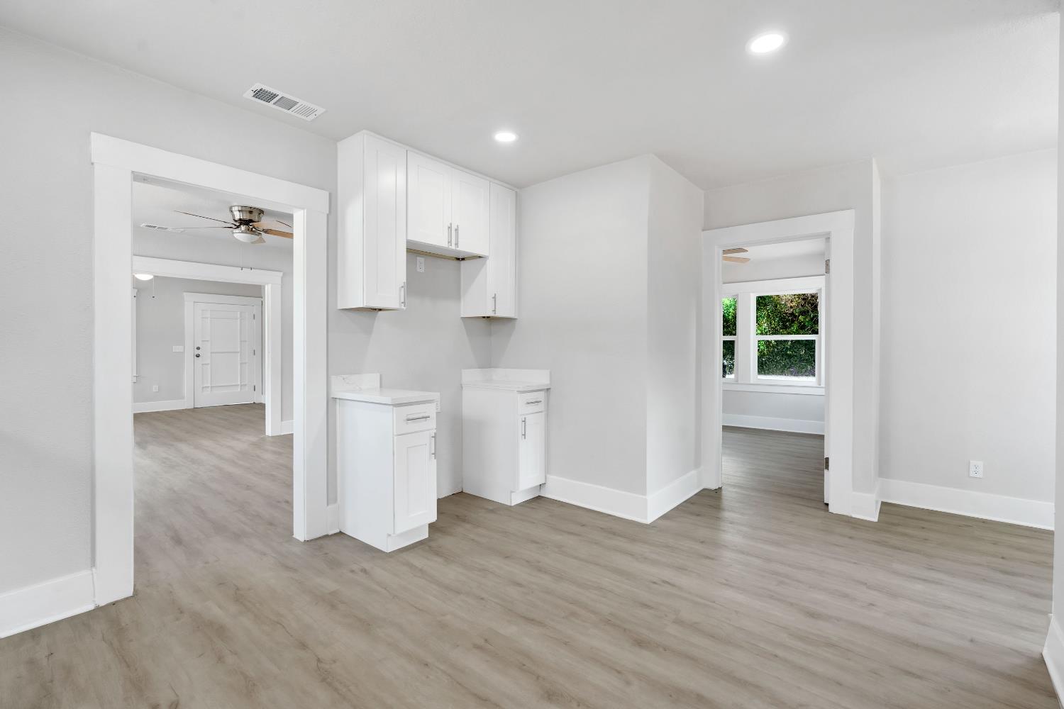 3935 East Balch Avenue Fresno, CA 93702 - Photo 14 of 25 a view of kitchen with wooden floor
