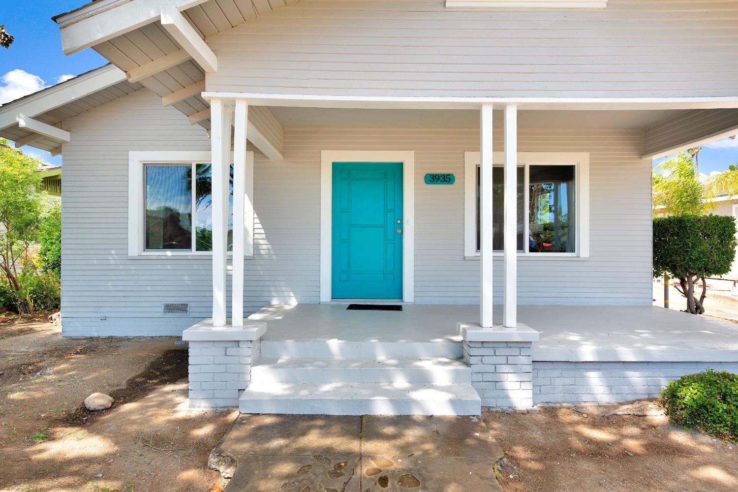 3935 East Balch Avenue Fresno, CA 93702 - Photo 4 of 25 a front view of a house with a yard