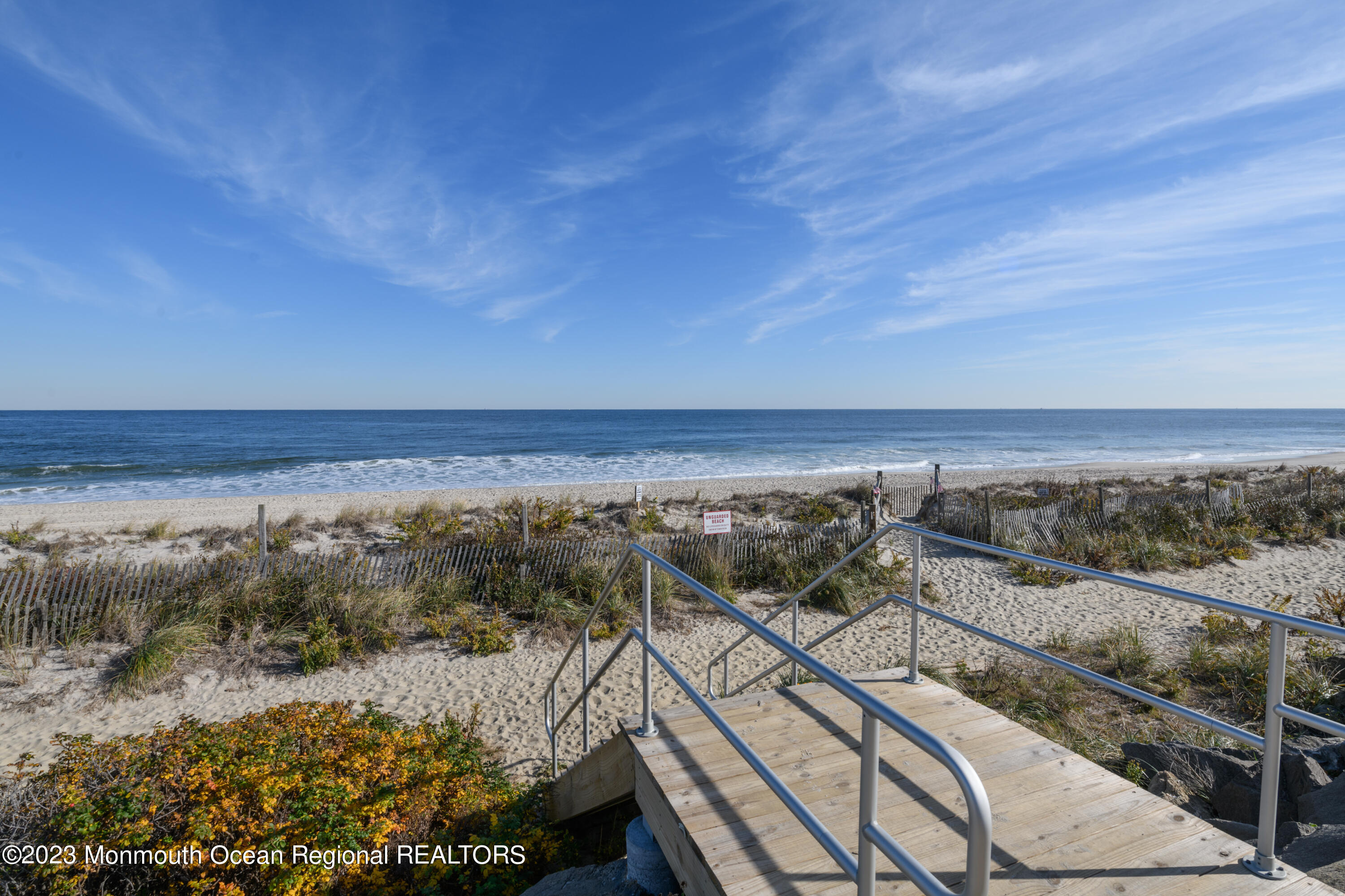 25 Village Road Sea Bright, NJ 07760 - Photo 7 of 37 a view of a balcony with an ocean view