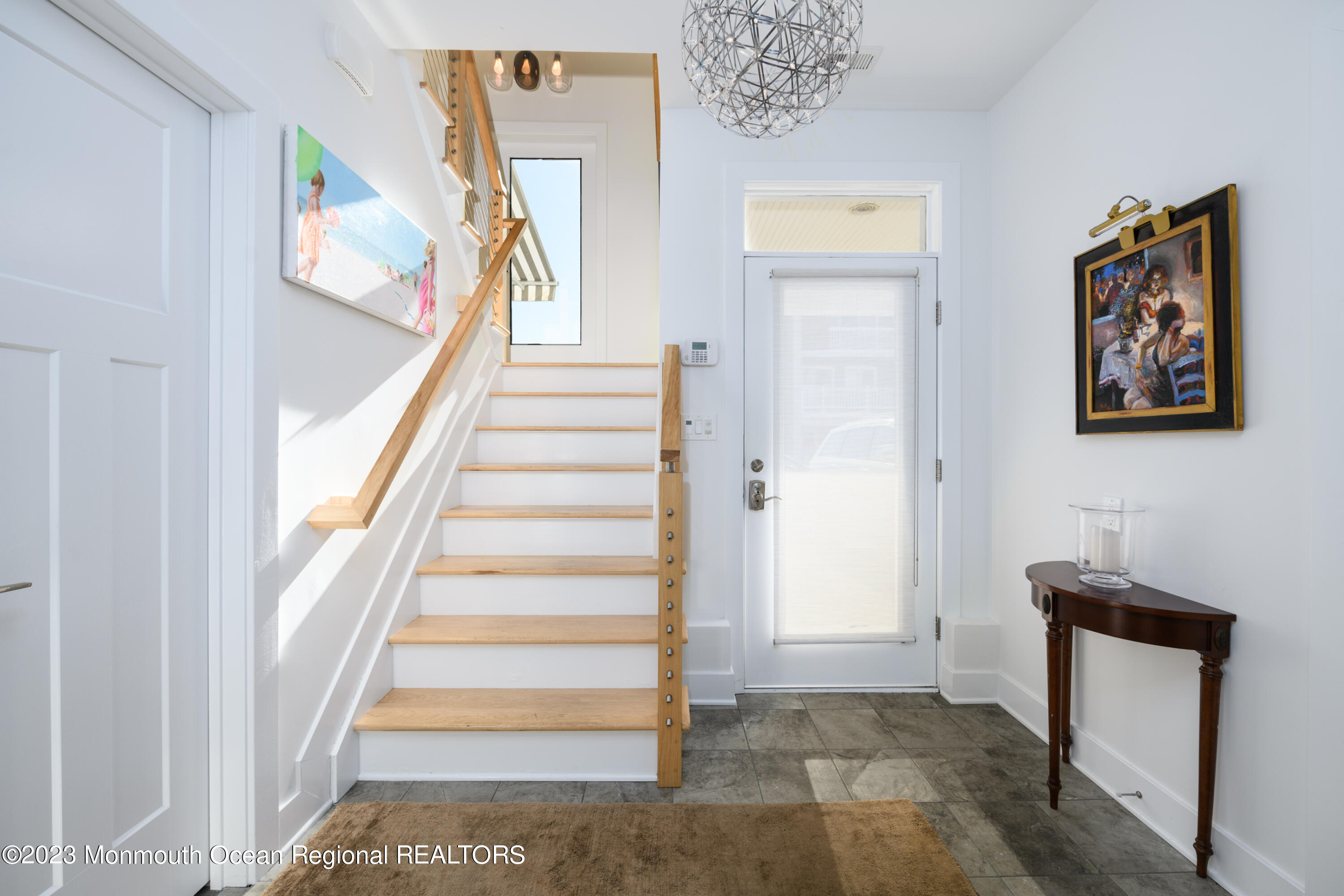 25 Village Road Sea Bright, NJ 07760 - Photo 10 of 37 a view of an entryway with wooden floor