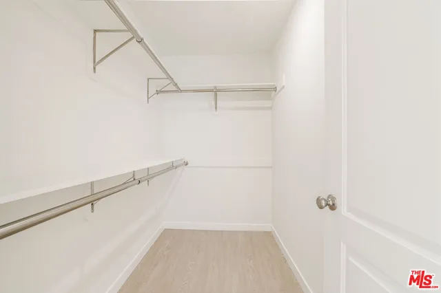 a view of a room with racks on the wall