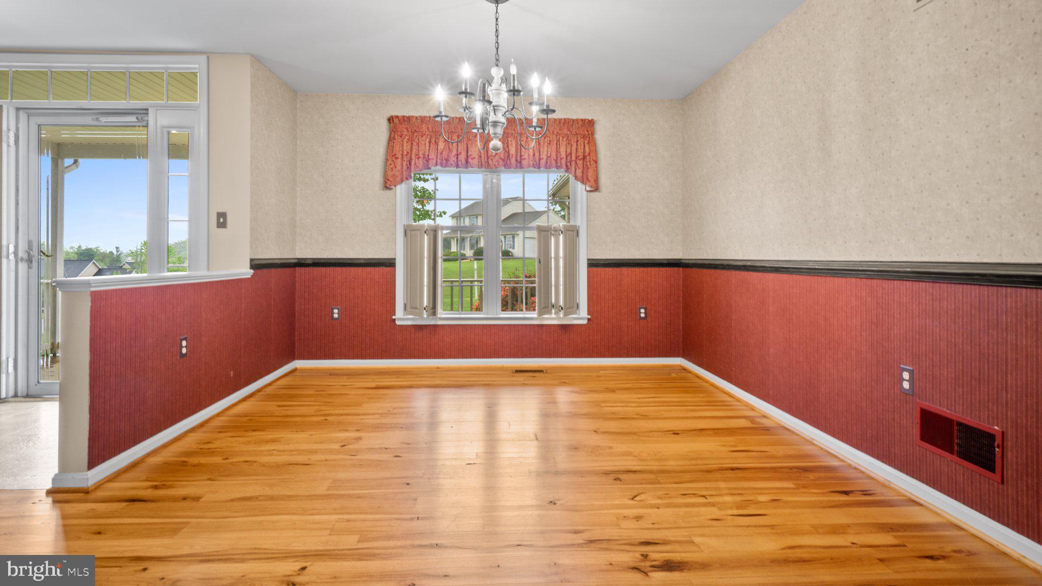 404 Michigan Drive Falling Waters, WV 25419 - Photo 11 of 28 Charming space with warm wood floors.