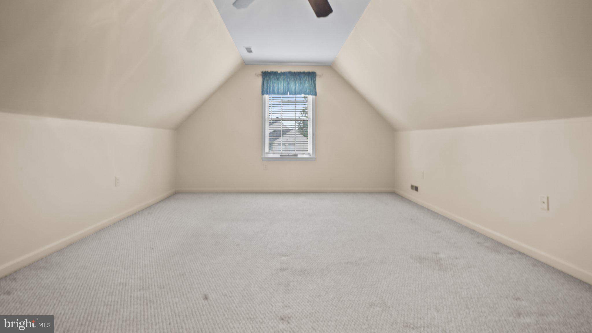 404 Michigan Drive Falling Waters, WV 25419 - Photo 19 of 28 Spacious attic retreat with natural light.