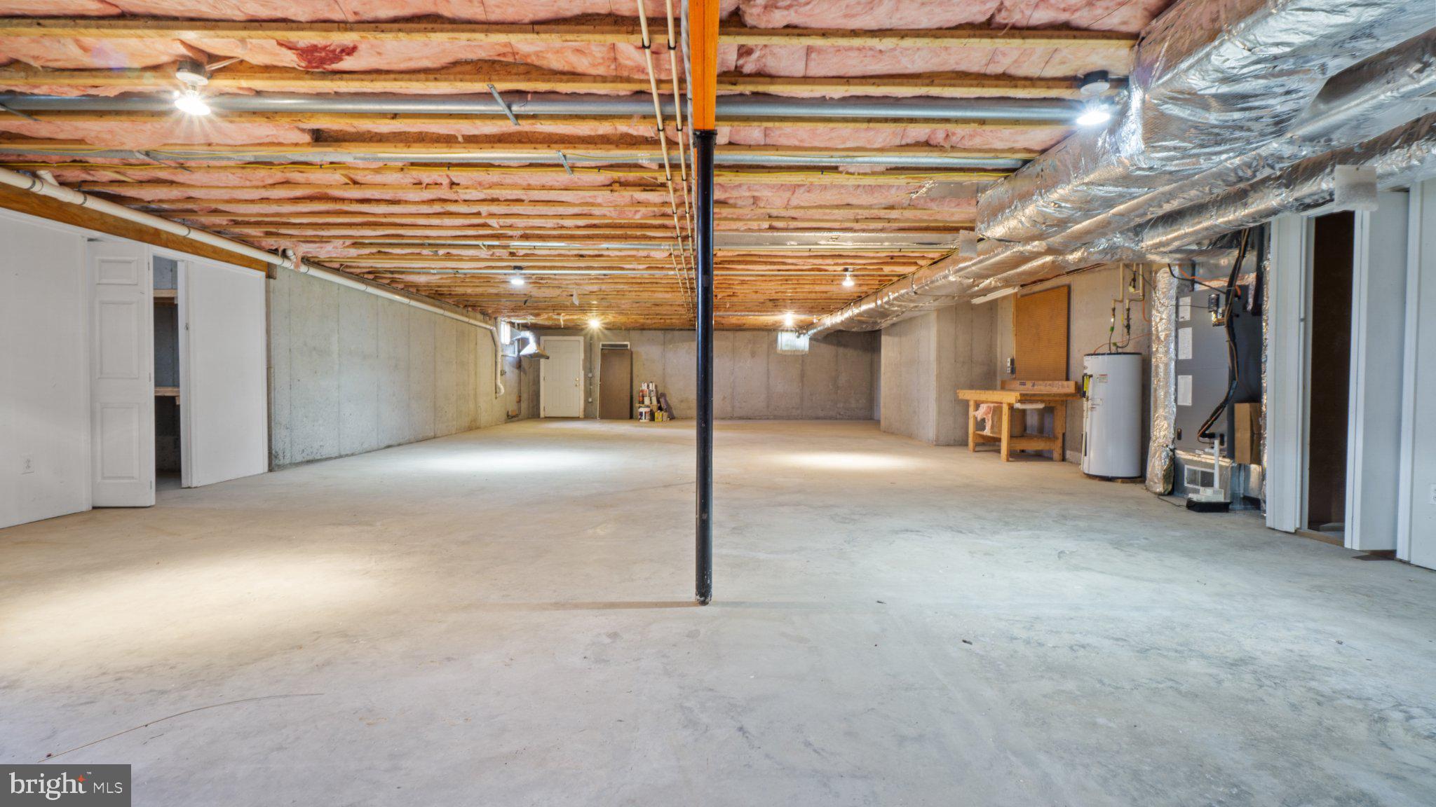 404 Michigan Drive Falling Waters, WV 25419 - Photo 22 of 28 Spacious, versatile basement ready for ideas.