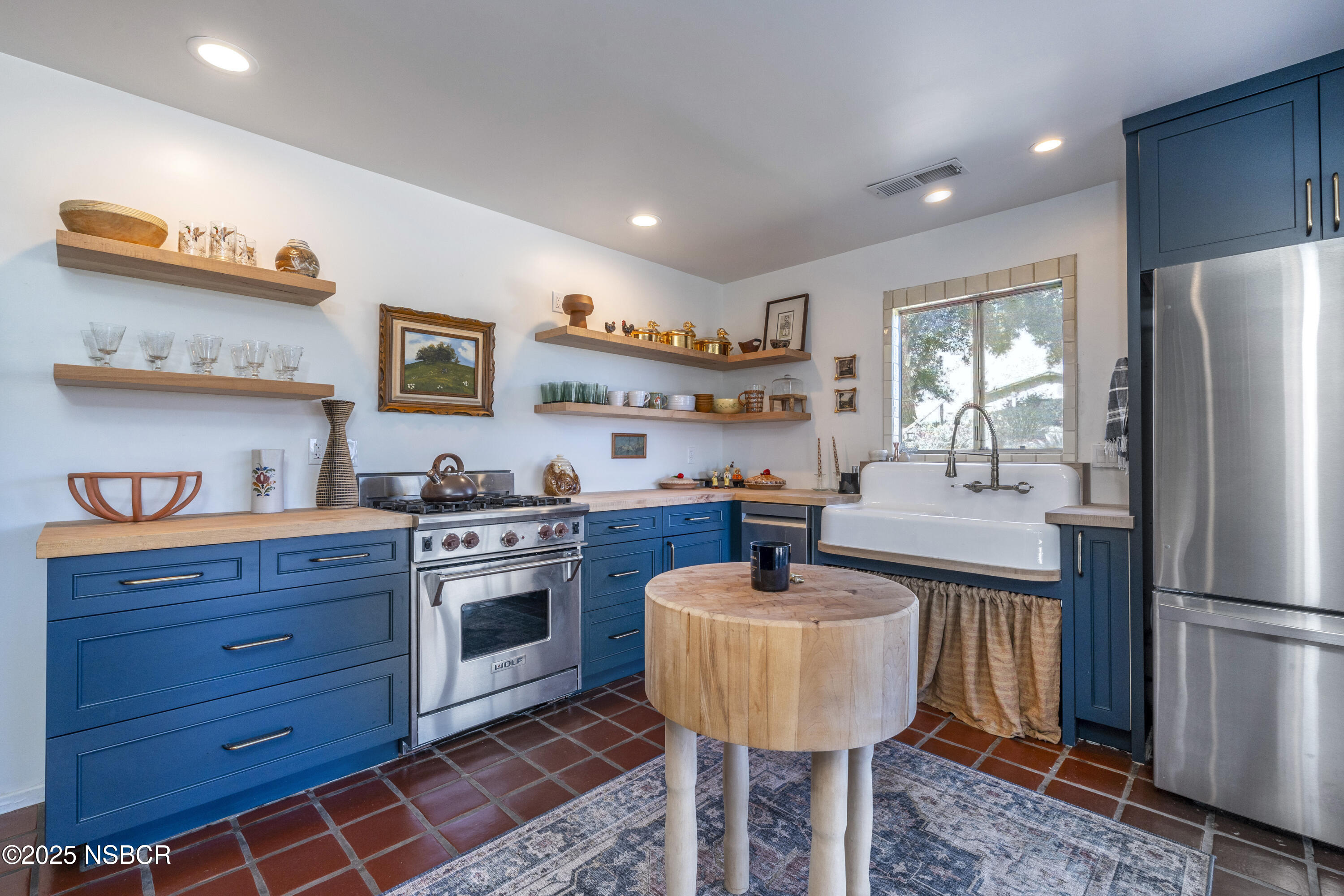 3776 Live Oak Road Santa Ynez, CA 93460 - Photo 14 of 46 a kitchen with stainless steel appliances granite countertop a sink a stove and a refrigerator