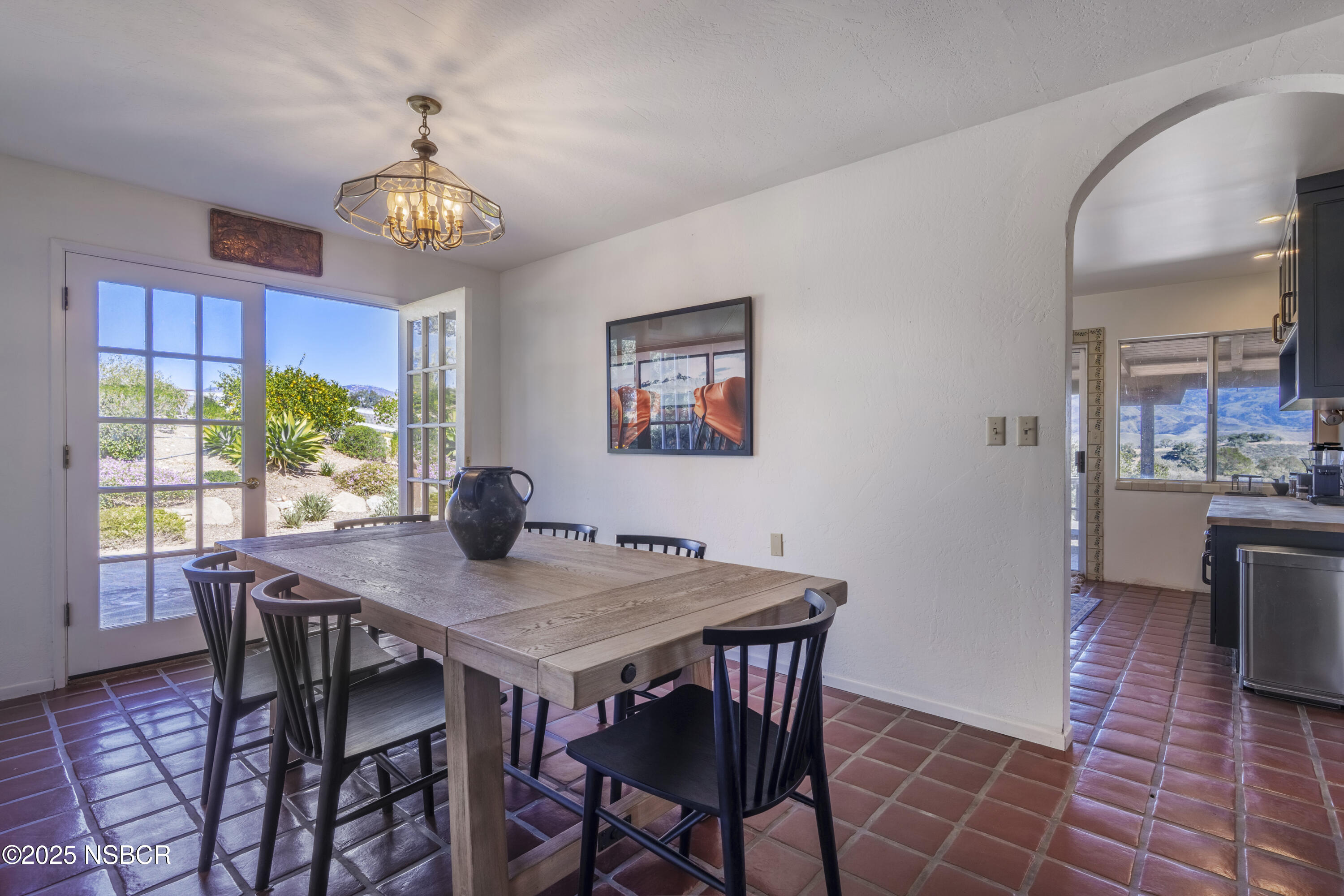 3776 Live Oak Road Santa Ynez, CA 93460 - Photo 16 of 46 a view of a dining room with furniture window and wooden floor