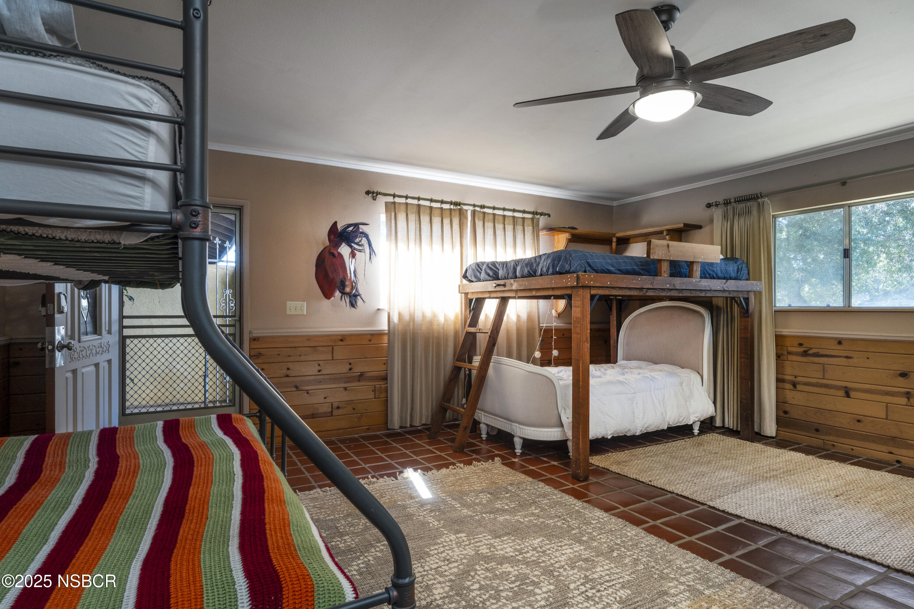 3776 Live Oak Road Santa Ynez, CA 93460 - Photo 21 of 46 a bed room with a bed and a ceiling fan