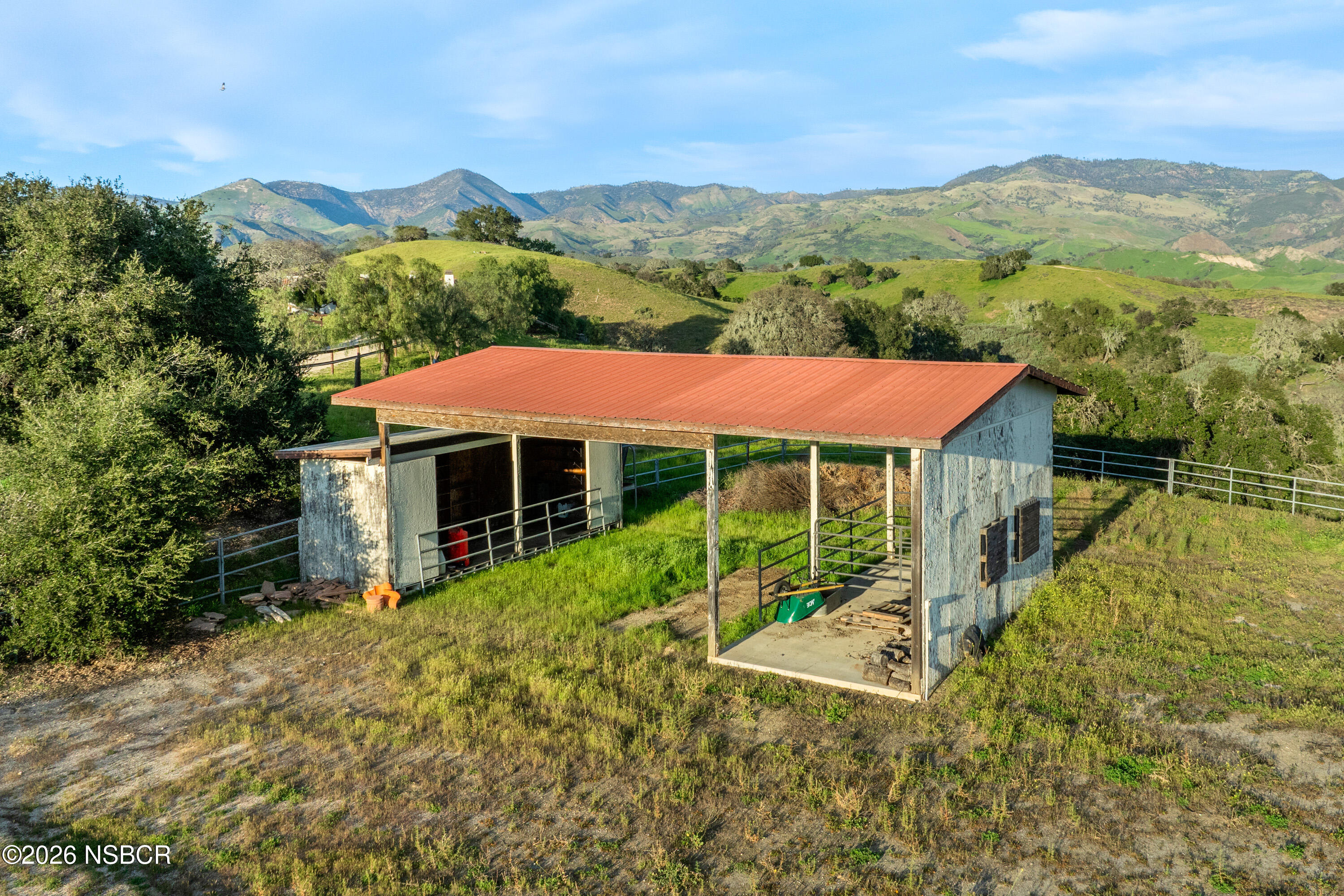 3776 Live Oak Road Santa Ynez, CA 93460 - Photo 32 of 46 a front view of a house with a yard and mountain view
