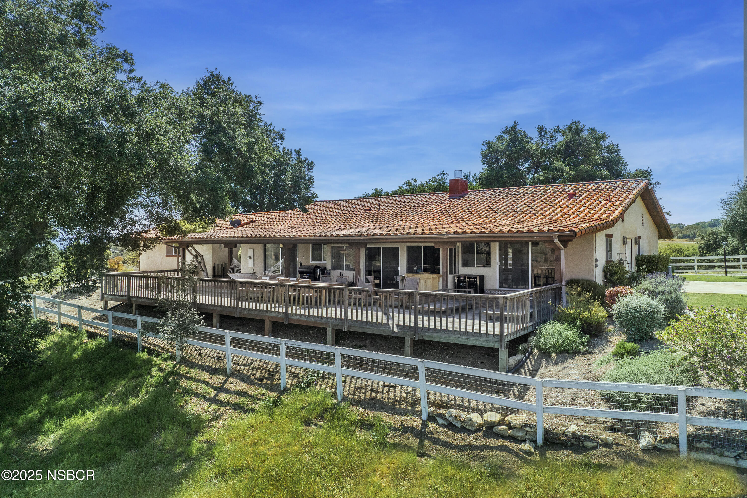 3776 Live Oak Road Santa Ynez, CA 93460 - Photo 9 of 46 a front view of a house with a yard balcony