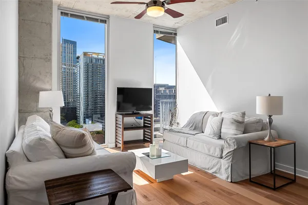 a view of a balcony with chairs