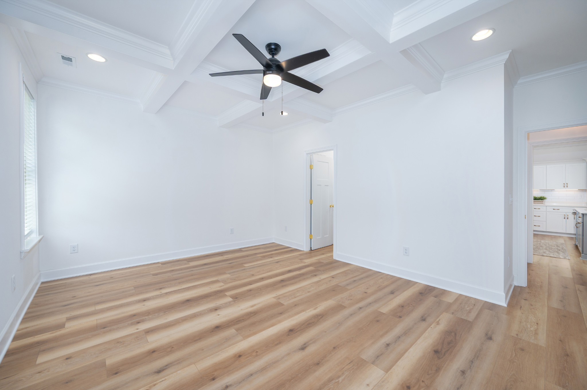 116 Nickolas Circle Lebanon, TN 37087 - Photo 12 of 32 a view of a livingroom with a ceiling fan and wooden floor