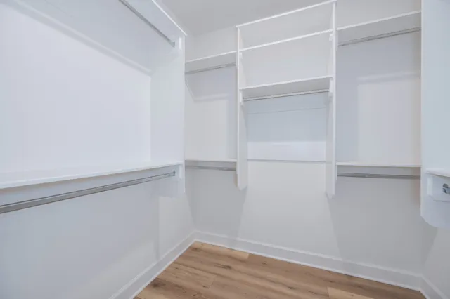 a view of an empty walk in closet