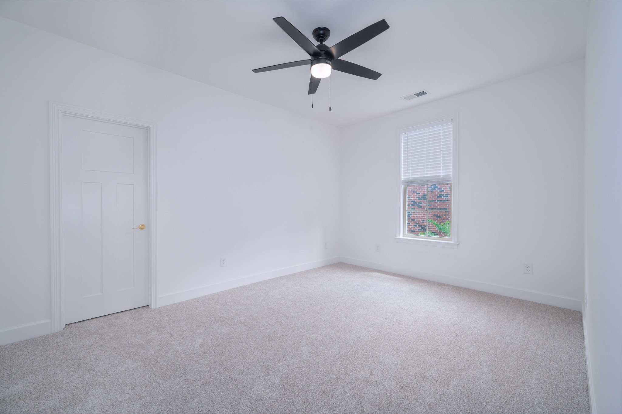 116 Nickolas Circle Lebanon, TN 37087 - Photo 23 of 32 an empty room with a window and a fan