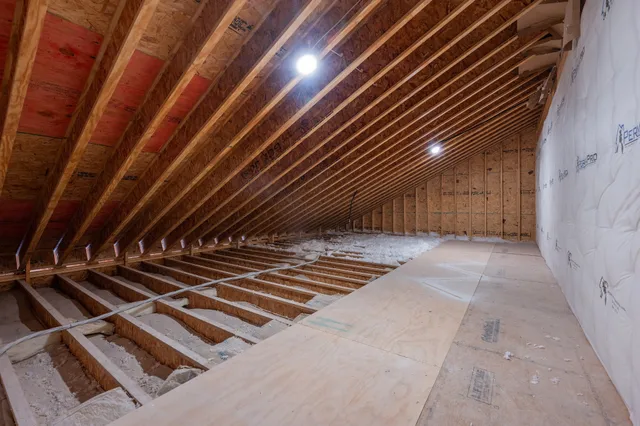 a view of room with wooden floor