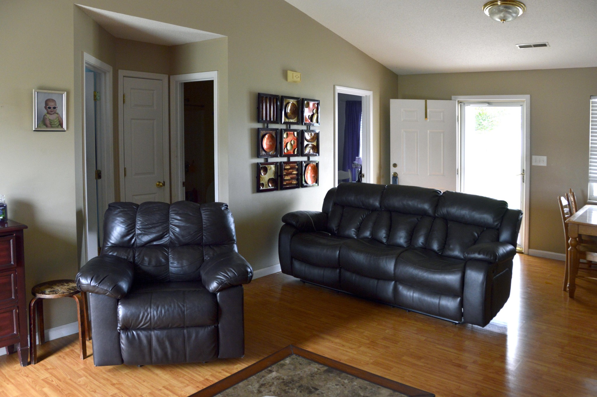 7725 Ralph Youmans Road Corryton, TN 37721 - Photo 4 of 17 a living room with a couch wooden floor and a window