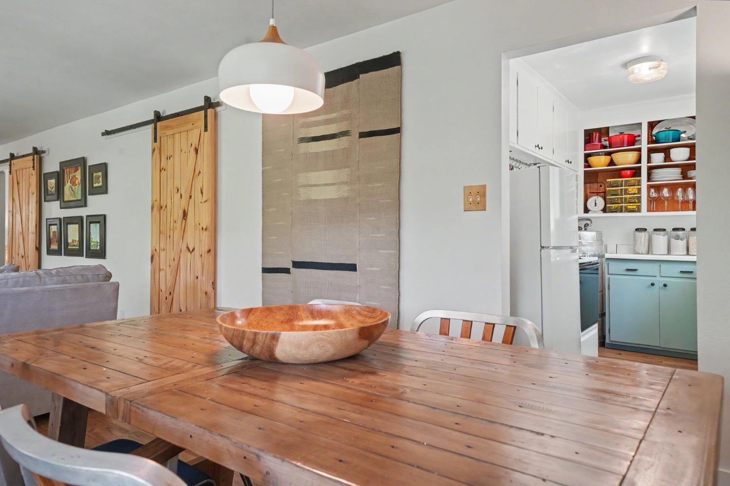 16308 Emigrant Trail Volcano, CA 95689 - Photo 13 of 29 a living room with stainless steel appliances furniture and a table
