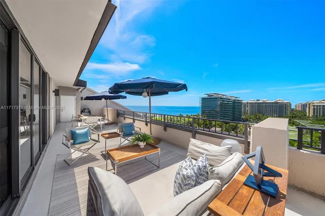 a view of balcony with furniture and stove