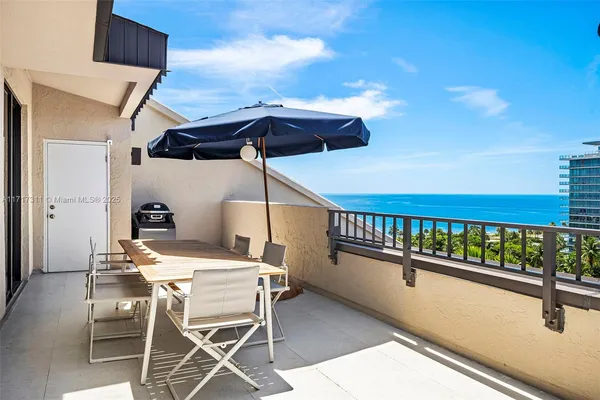 a view of swimming pool with a lounge chair