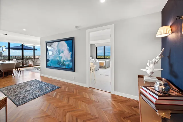 a living room with furniture and flat screen tv