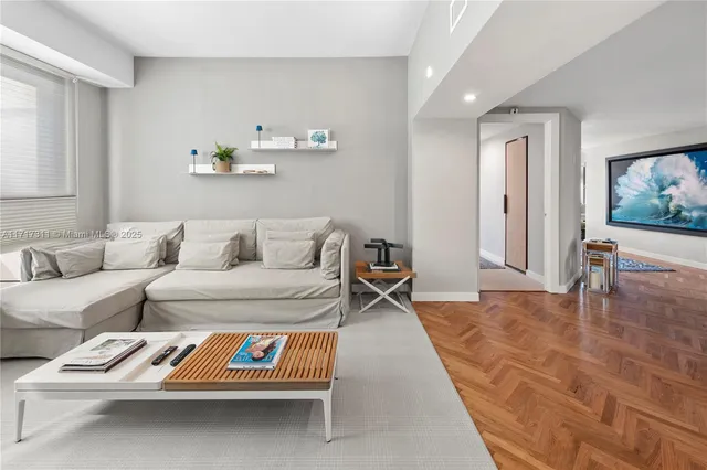 a large kitchen with a table and chairs in it