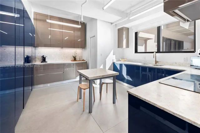 a spacious bedroom with a large bed and a window