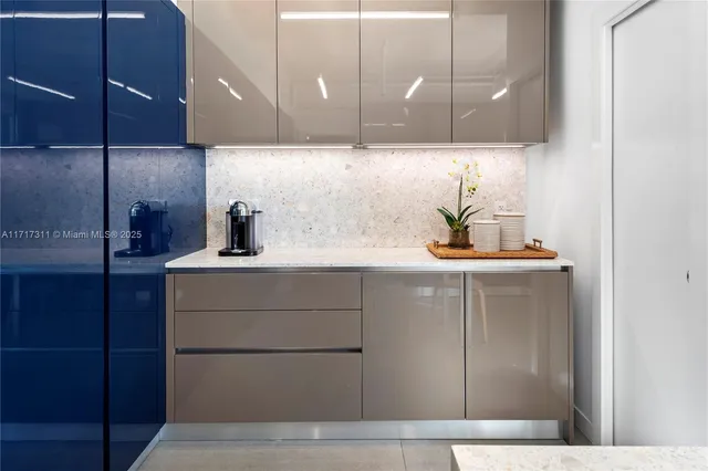 a bedroom with a large bed and a large window